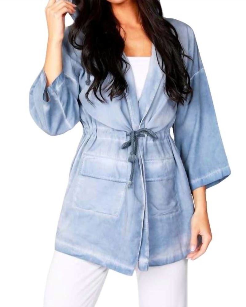 Front of a model wearing a size LG Jennifer Hooded Long Trench Coat in Denim in Denim by french kyss. | dia_product_style_image_id:326668